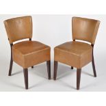 Warings: a pair of leather covered stained wood chairs, 82cms high.