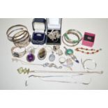 A large quantity of silver jewellery, including: bangles; rings; pendants; etc.