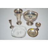 Silver, to include: three vases; a tazza with associated glass liner; and a small bowl.