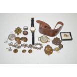 Military buttons and cap badges; a white metal necklace; and a trench watch cover.