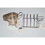 A silver five bar toast rack, by T. & J.H.