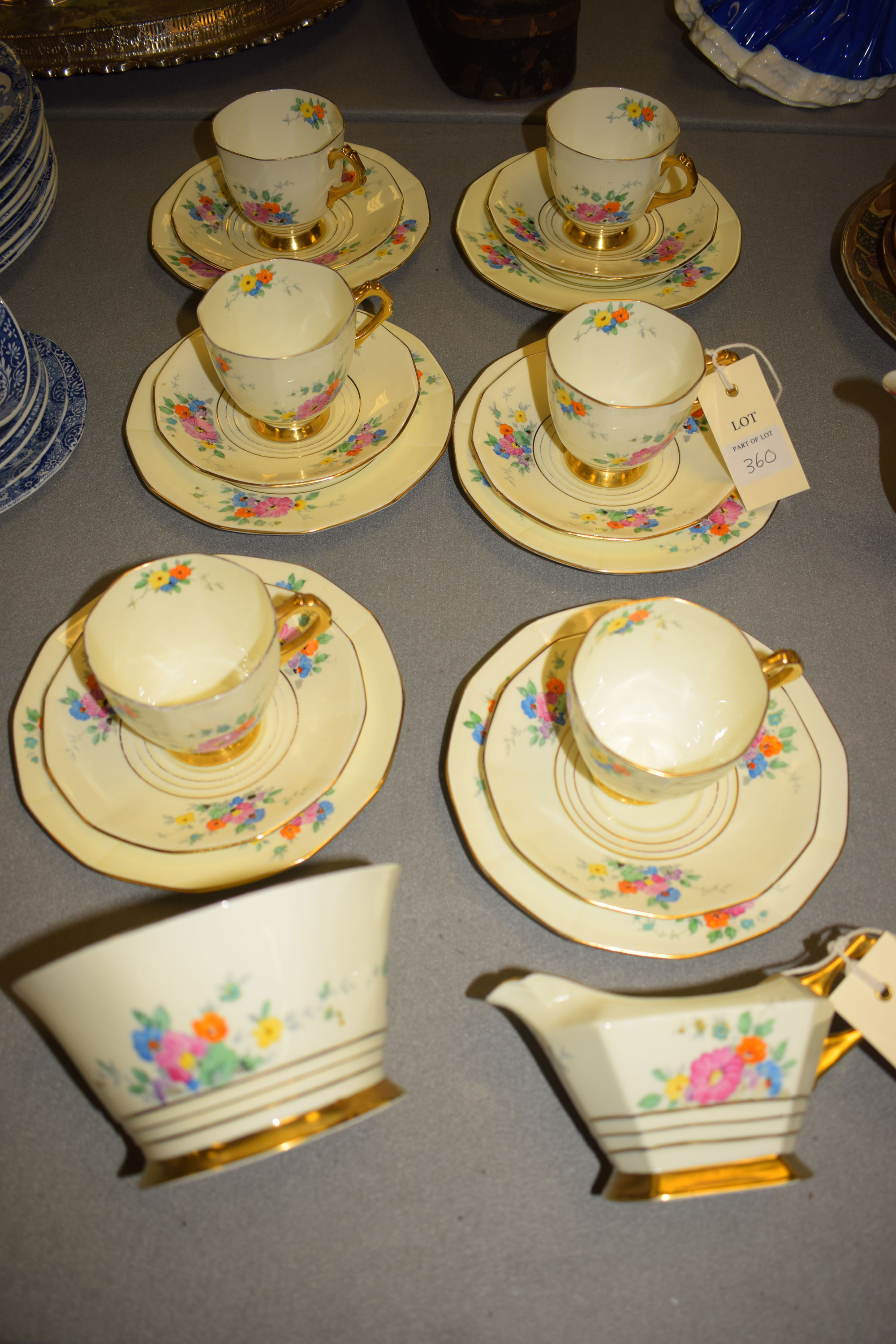 Plant Tuscan china: twenty piece tea set with octagonal cups decorated hand-painted sprays of