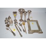 Silver items, to include: condiments; vases; photograph frames; and cutlery.