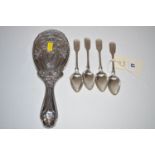 Four silver fiddle pattern teaspoons; together with an Art Nouveau silver hairbrush backing.