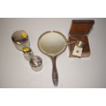 A silver backed dressing table hand mirror,