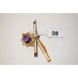 An amethyst and seed pearl set brooch/pendant,