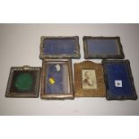 A quantity of silver mounted photograph frames; and another photograph frame.