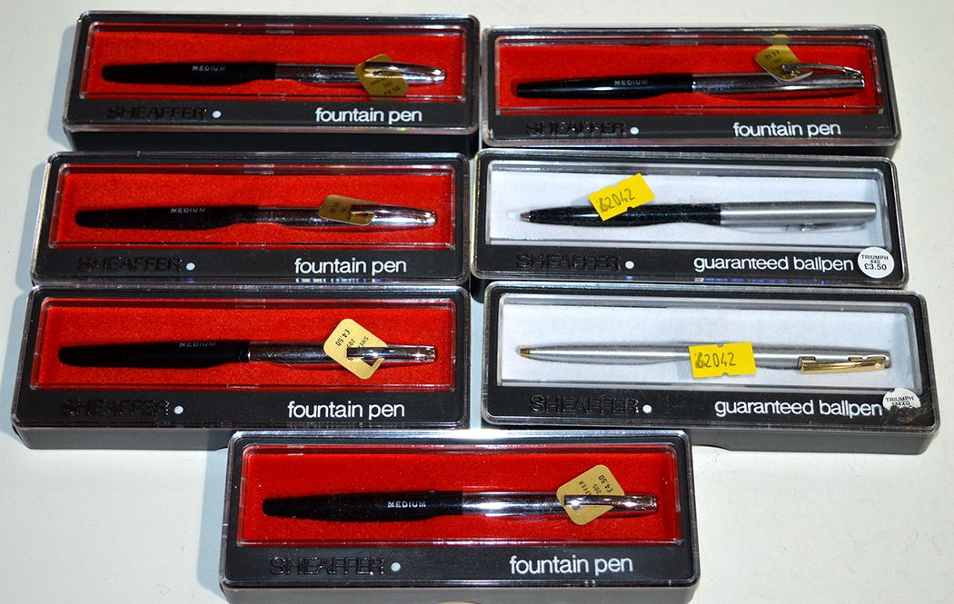 Five Sheaffer fountain pens in plastic cases,
