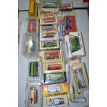 A large quantity of die-cast model vehicles, including: buses and vintage vehicles.