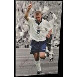 An Alan Shearer signed photographic print.