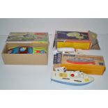 A Sutcliffe toy Victor clockwork torpedo boat, boxed; a Dinky toys USS Enterprise,