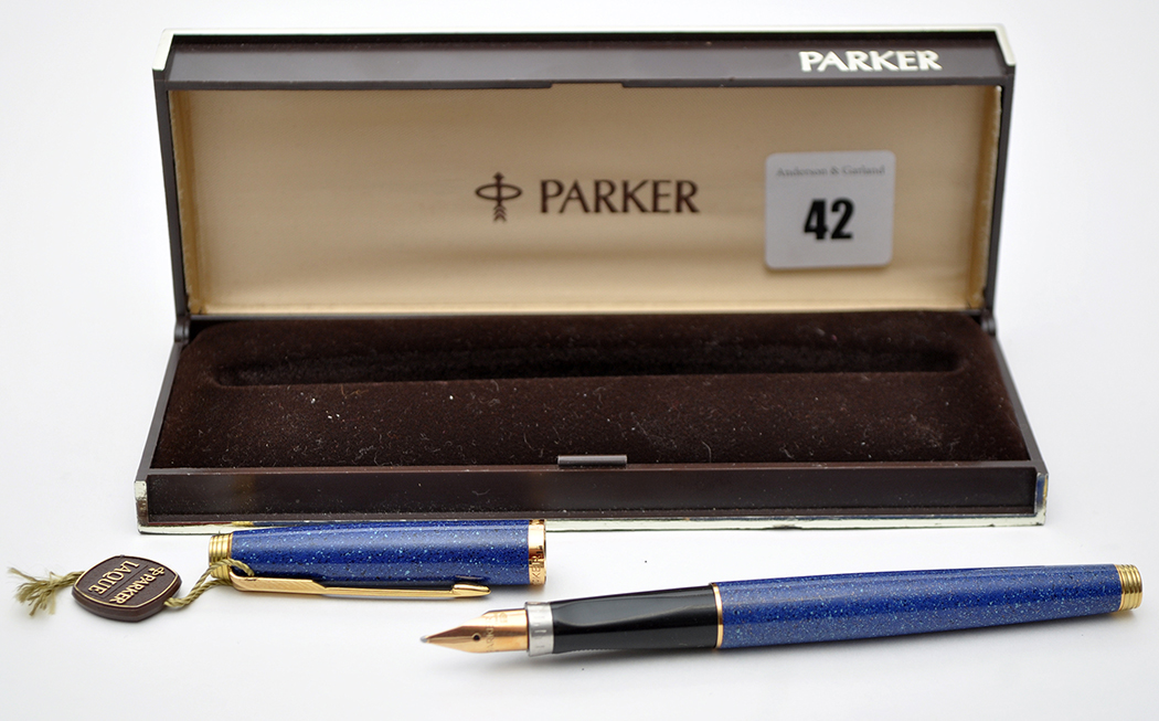 A Parker Laque lapis lazuli case fountain pen, fitted 14ct. gold nib, boxed.