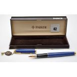 A Parker Laque lapis lazuli case fountain pen, fitted 14ct. gold nib, boxed.