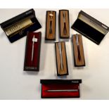 A Parker fountain pen in steel case; two Parker propelling pencils; and four ballpoint pens,