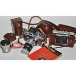 A Voigtlander Vitessa T 35mm rangefinder camera fitted Turnit 3 accessory viewfinder and