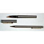 A Sheaffer fountain pen and pencil set, in steel matte cases, the fountain pen fitted 14ct.