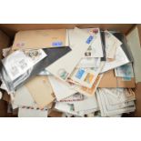 A box containing hundreds of first day covers, mainly British.