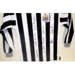 A 1969 Fairs Cup replica shirt, signed by seven members of the Newcastle squad,