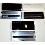 Two Parker fountain pens in black matte metal cases; together with a Parker 25 ballpoint pen,
