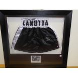 A pair of 'Lamotta' boxing shorts, signed by Jake Lamotta,