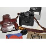 A Nikon F3 SLR camera body (black) complete with standard and HP pentaprism viewfinders;