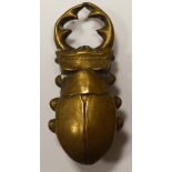 An early 20th Century brass dung beetle pattern vesta case, 6.5cms.