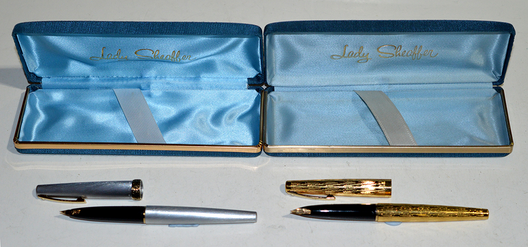 Two lady Sheaffer fountain pens, one in gold plated case with zigzag decoration,