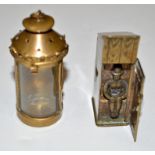 An Edwardian brass vesta case in the form of an outdoor netty,