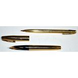 A Sheaffer fountain pen, in gold electro plated reeded case, fitted 14ct.