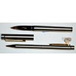 A Sheaffer fountain pen and pencil set, both in matte steel cases, the fountain pen fitted 14ct.