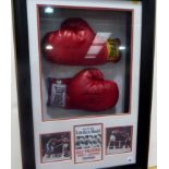 Two Everlast replica boxing gloves, signed by Mohammed Ali and Joe Frazier II,