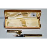 A Sheaffer Targa 1005 fountain pen, in gold electroplated case, fitted 14ct. gold nib, cased.