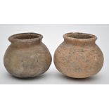 Two pottery jars, probably Chinese, with chevron bands and other impressed markings,