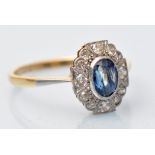 A sapphire and diamond ring, the oval facet cut sapphire surrounded by eight-cut diamonds,