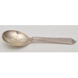 A George VI preserve spoon, Georg Jensen, bears import marks for London 1946, pyramid pattern, 1.