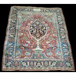 A fine Doroksh rug, with tree-of-life design to red field, signed to upper border,
