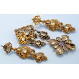 A mid Victorian chrysoberyl and yellow metal demi-parure, to include: brooch with double drop,