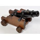A mid 19th Century black painted cast iron signal canon,