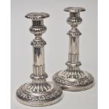 A pair of George III candlesticks, by John and Thomas Settle, Sheffield 1816,