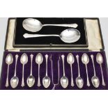 A set of twelve George V teaspoons and matching sugar tongs, by Walker & Hall, Sheffield 1911,