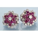 A pair of ruby and diamond earrings, by Chaumet, London, each of cluster form,