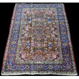 A Bakhtiari rug, decorated with full floral scrolling decoration, 218 x 143cms (85 1/2 x 56in.).