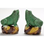 Pair of Chinese figures of mythical toads, enamelled on the bisque in green, yellow and aubergine,