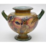 Moorcroft 'Pomegranate on Ochre' twin handled urn, buff-green graduated pear shaped body and foot,