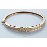 A diamond set bangle,