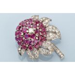 A ruby and diamond flower pattern brooch,