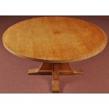 Malcolm "Foxman" Pipes: a circular oak dining table,