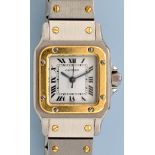 Cartier Santos: a lady's steel and gold bracelet watch,