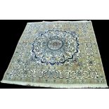 A Nain carpet, with large central rosette, 204 x 192cms (80 x 75 1/2in.).