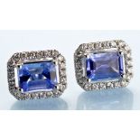 A pair of tanzanite and diamond cluster stud earrings,